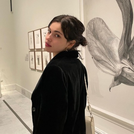 Cristina Kovani is spending time at an art gallery.
